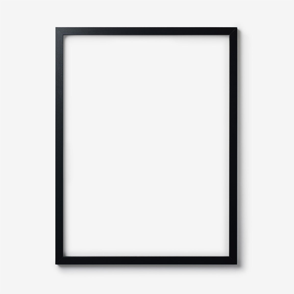 An extra large rectangular black wood frame on a white background