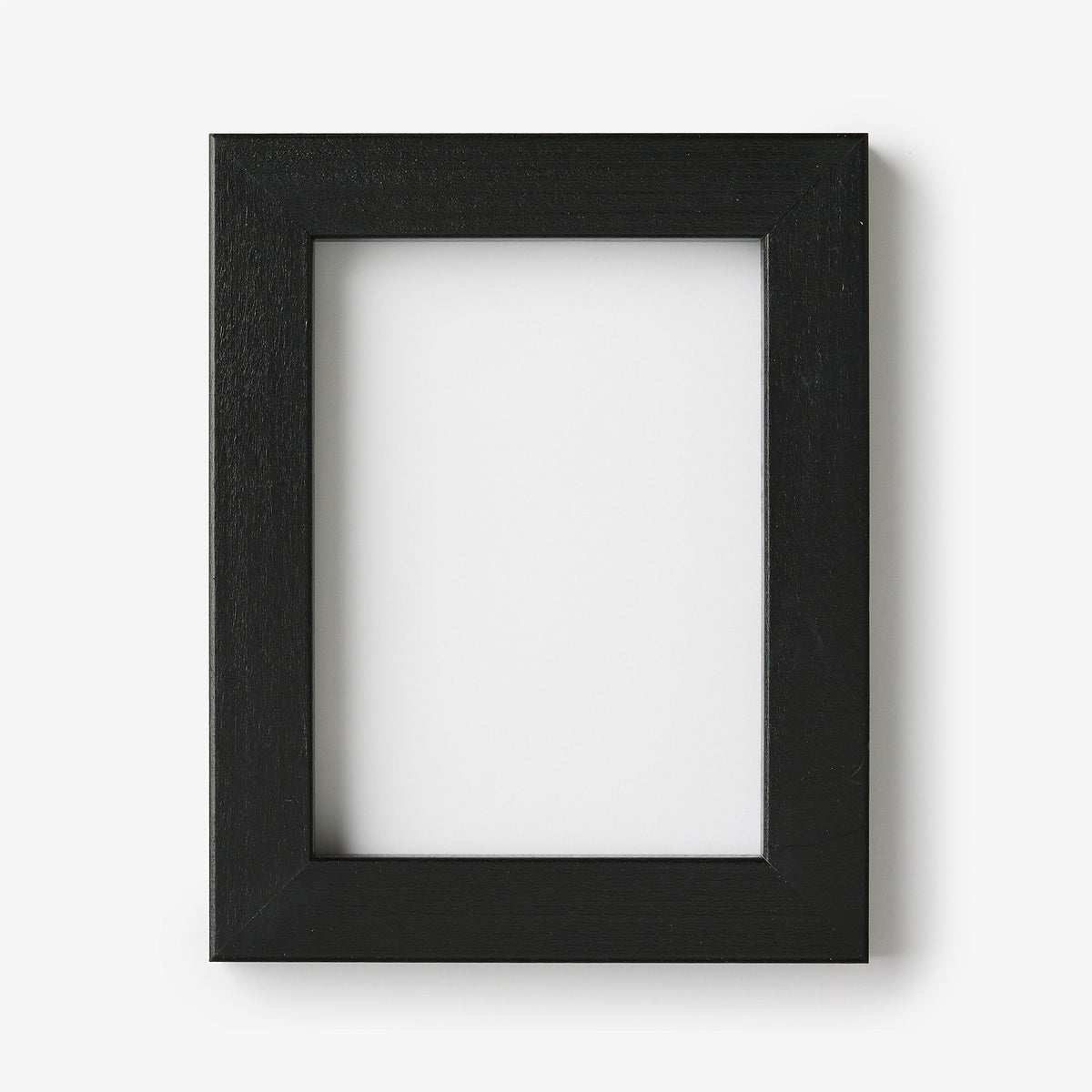 An extra small rectangular black wood frame on a white background