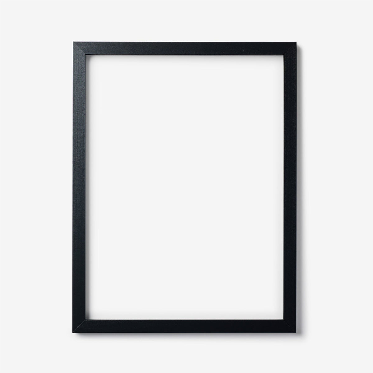 A large rectangular black wood frame on a white background
