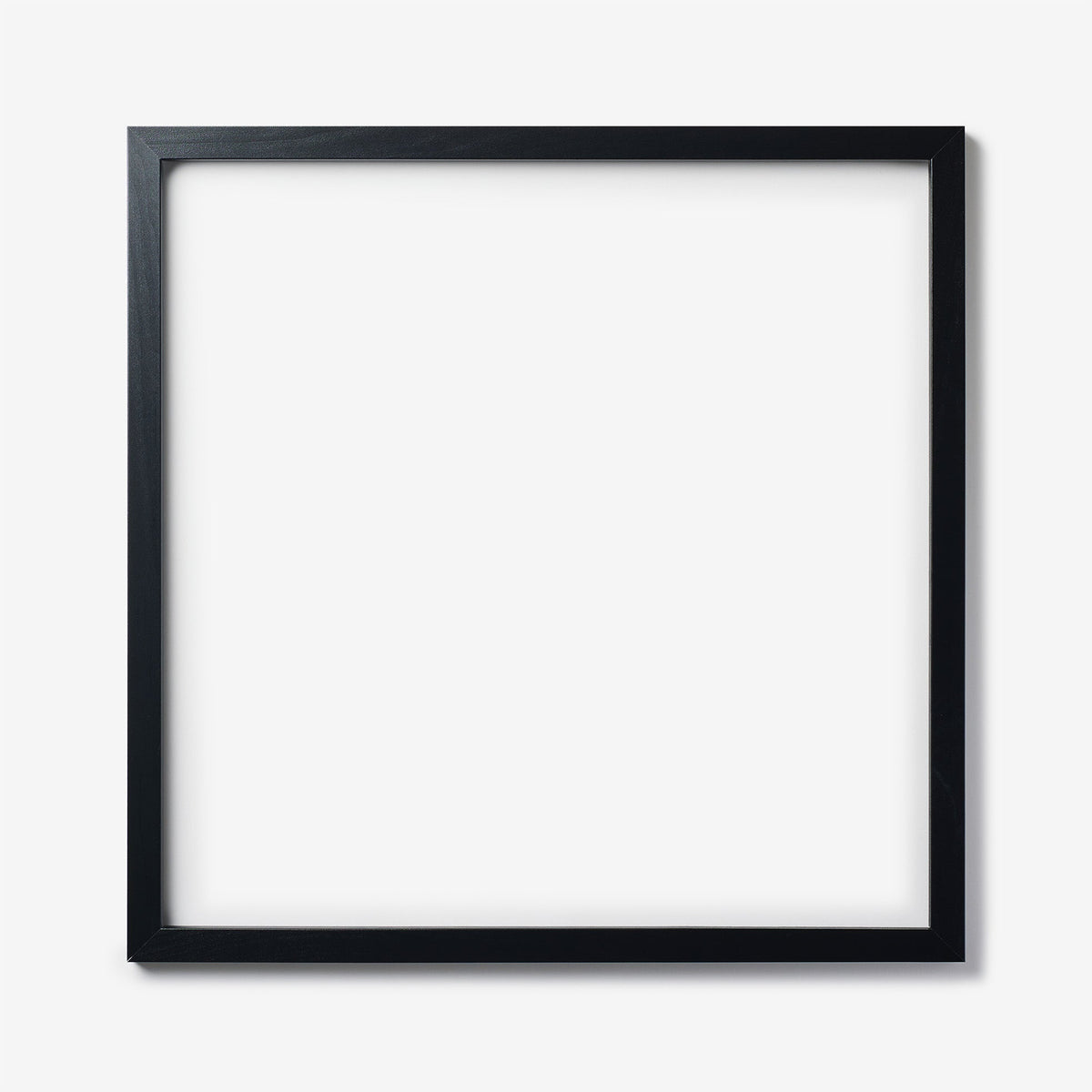 A large square black wood frame on a white background